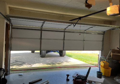 Repaired and insulated garage door in Peachtree City GA